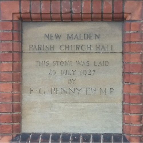 Parish Halls foundation stone reading 'New Malden Parish Church Hall. This stone was laid 23 July 1927 by F G Penny Esq MP.'