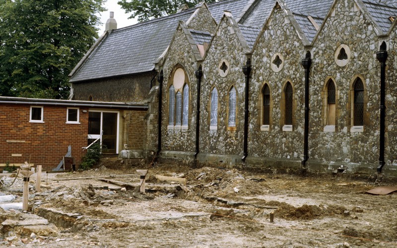 Photo of the north wall together with the Vestry Hall following the clearing of the orchard