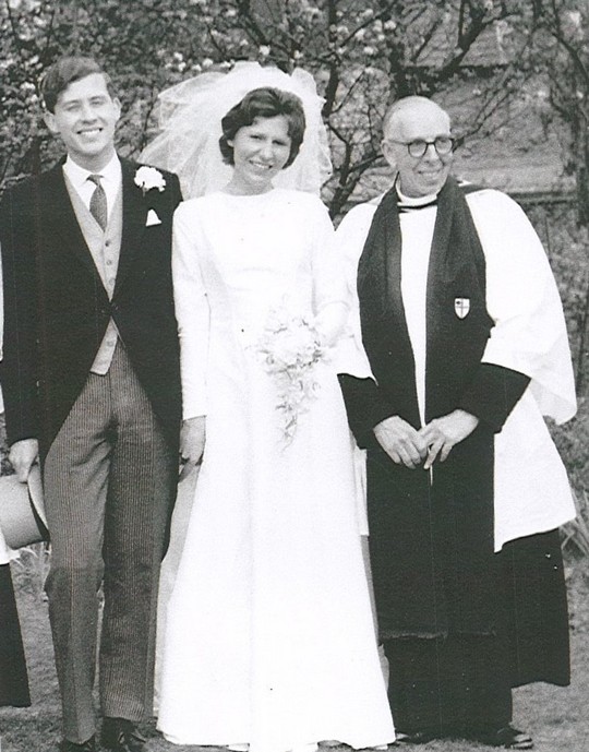 Wedding photo of John and Elizabeth Searle, with Llewellyn Roberts