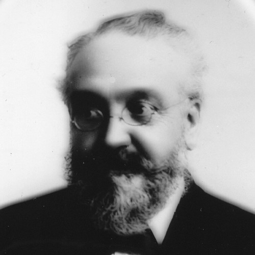 Photo of Alfred Streeter in formal attire, bearded with glasses